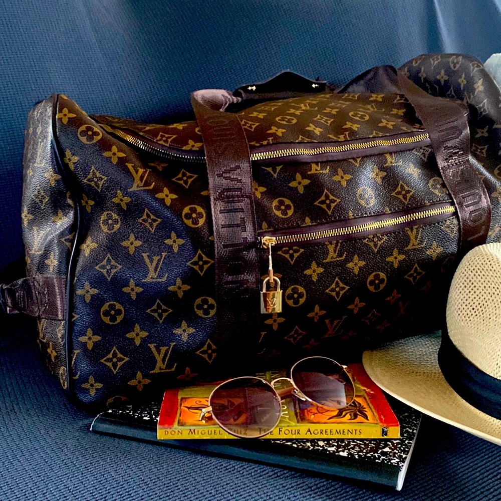 Authentic Louis Vuitton luggage bag. In mint condition.